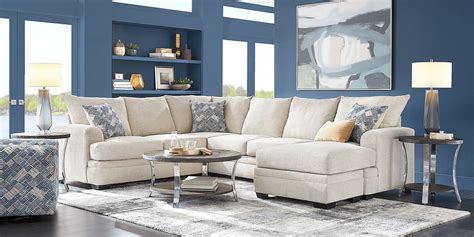 Rooms to go copley court - Sleekly designed, the Copley Court sectional creates a cozy, contemporary place to relax. Upholstered with plush chenille fabric in a crisp shade of parchment beige, this sectional features tight slip over arms, reversible seat cushions and sumptuous seating perfect for lounging. Included accent pillows offer a colorful splash of blue, gray and ...